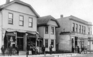 a group of people standing outside of a building