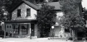 a black and white photo of a house