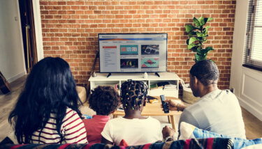 family watching educational content on an ott streaming platform