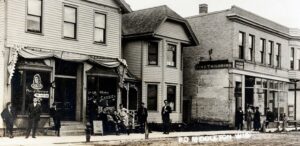 a group of men standing outside of a building